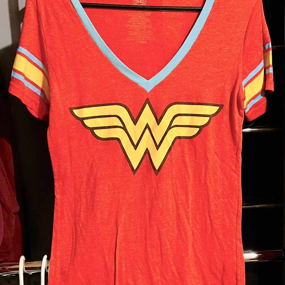 Vintage “Wonder Woman” graphic tee. Woman’s, size L, lightly worn.